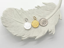Back of the pendant featuring a hammered look. Showing it in silver or gold and next to dime for size comparison.