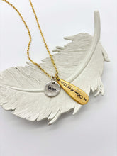 An example of a personalized necklace you could create with this listing by add another charm from my build your own section. This necklace has a gold medium thickness cable chain with 2 charms adorned from it. One round silver charm with brave on it and another oblong teardrop with the word survivor on it.