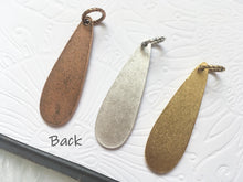 Back of the oblong teardrop pendants