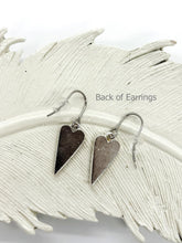 The back of the earrings is a smooth finish.