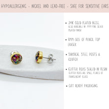 Product infographic for handmade jewelry featuring two 8mm round stud earrings with multi-colored translucent glass flakes sealed in resin. One earring is shown from the front and one from the side, showcasing the 24K gold-plated bezel and surgical steel post. Text highlights hypoallergenic, nickel, and lead-free features for sensitive ears, availability in .999 fine silver, an 8mm pencil-eraser size, and gift-ready packaging.