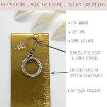 Infographic for a small silver dangle hoop earring placed against a ruler for measurement. The top banner reads "HYPOALLERGENIC - NICKEL AND LEAD-FREE - SAFE FOR SENSITIVE EARS". Listed features include lightweight, 1.25" long, and 16mm (.62") wide. Arrows point to the stainless steel posts with rubber stoppers and the circular hoop, highlighting 24K gold plated or .999 fine silver plated finish options, alongside gift-ready packaging